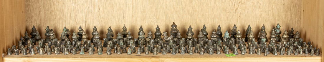 A shelf of Burmese bronze weights (1 of 1)
