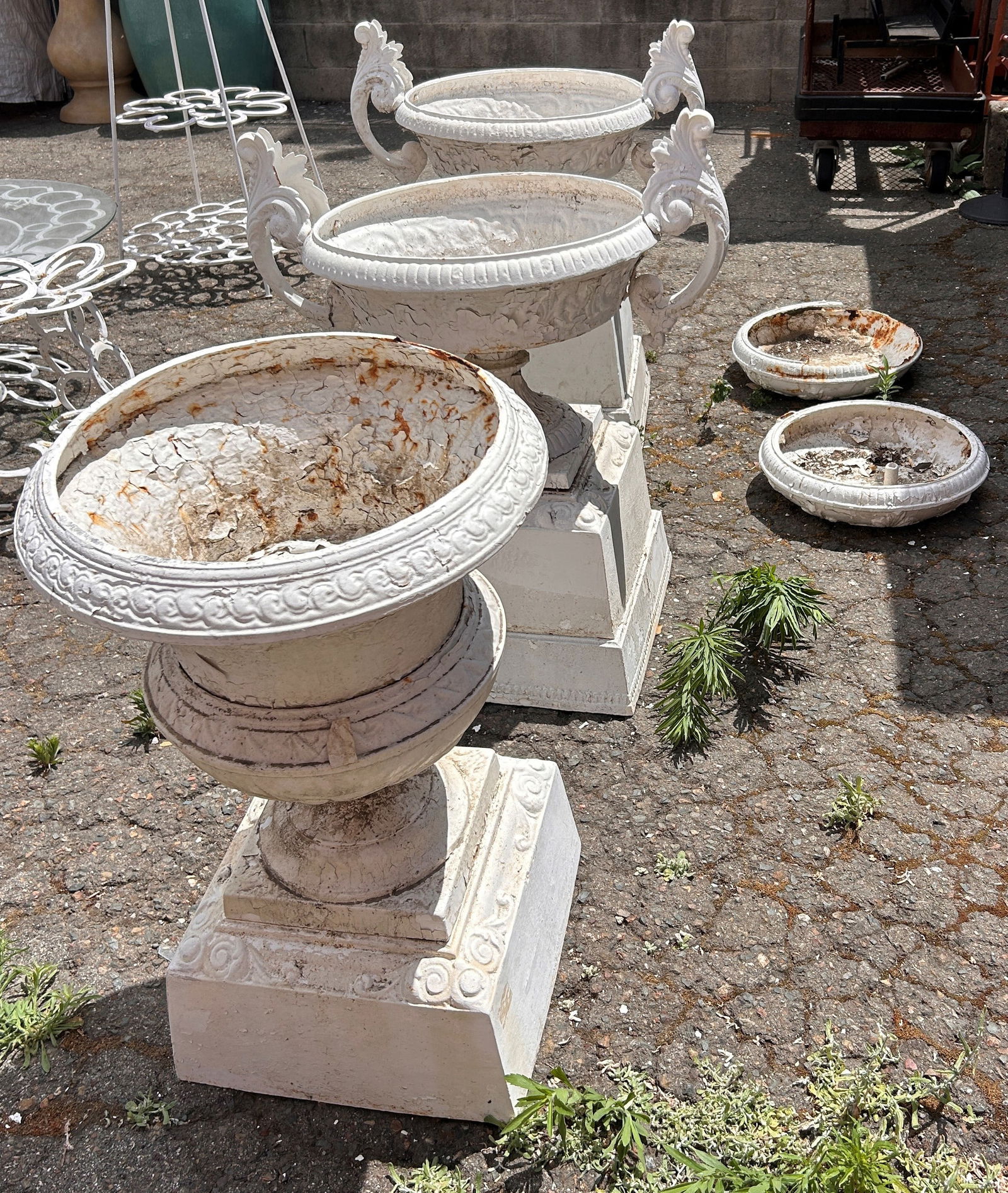 A group of three large Victorian cast iron urns with two fountain basins (1 of 1)