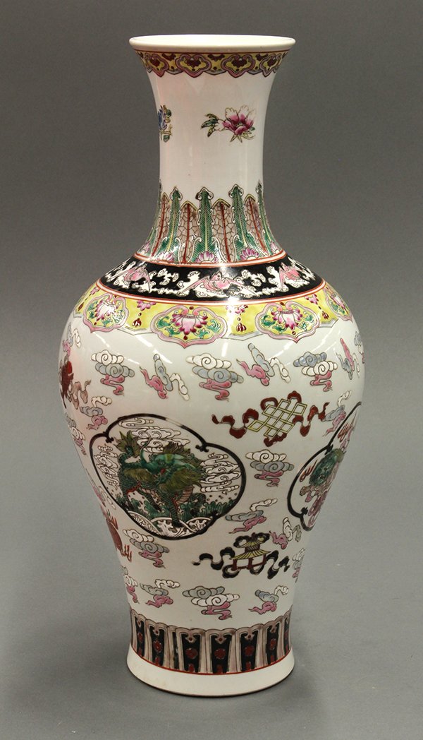 Chinese Porcelain Trumpet Neck Vase, Qilin/Fu-lions: Chinese polychrome enameled porcelain vase, with a trumpet neck encircled with sprigs and stiff leaves, above a band of bats and clouds, the tapering body with qilin and fu-lions in reserves amid colo