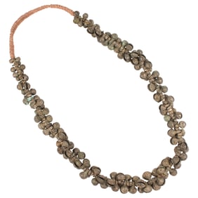 A group of Southeast Asian bronze bell beads