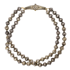 An Indian silver double-strand bead necklace with curved clasp