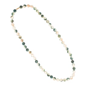 A green helmet shell bead necklace