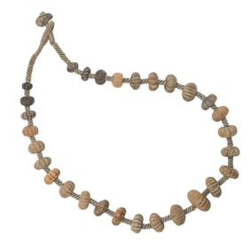 A strand of Middle Eastern or Central Asian ceramic melon beads