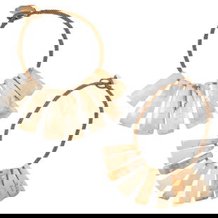 A group of Pre-Columbian mollusk shell struts: A group of Pre-Columbian mollusk shell struts. Strung as two necklaces, possibly from Northern Peru, from 2.125" to 3.25" long.