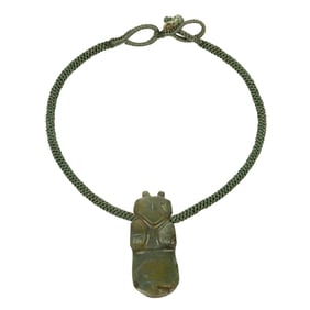 A Pre-Columbian owl effigy ax pendent
