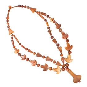 A Pre-Columbian Tairona carnelian bead necklace and pendant