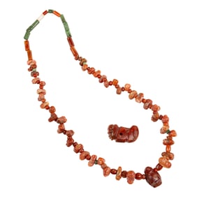 A Tairona carnelian and turquoise bead necklace and two pendants