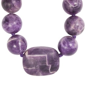 An amethyst beads necklace with labradorite clasp