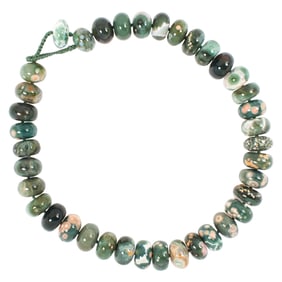 A strand of Chinese mottled green jasper beads