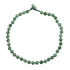 A Chinese green stone bead necklace