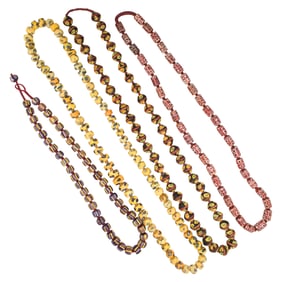 Four strands of antique Venetian beads