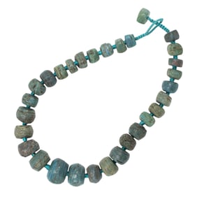 A strand of antique Hebron turquoise glass beads from Nigeria