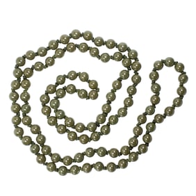 A strand of Chinese green glazed porcelain beads
