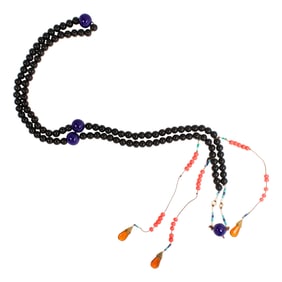 A Chinese glass court necklace