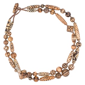 Two strands of Burmese pumtek beads