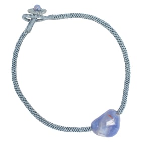 An ancient Persian blue chalcedony bead