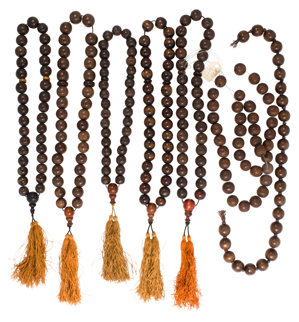 Seven strands of Sino-Tibetan aloeswood prayer beads: Seven strands of Sino-Tibetan aloeswood prayer beads. 20th century, 16" longest. Provenance: Naomi Lindstrom