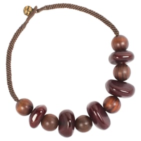 A reconstituted amber and wooden prayer bead necklace