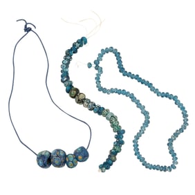 A group of Warring States blue glass 'eye' beads
