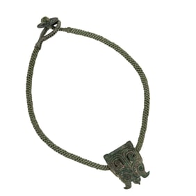 A Chinese bronze mask-form harness ornament