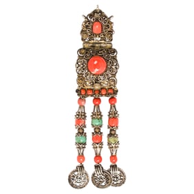 A Tibetan gilt silver, coral and turquoise belt ornament