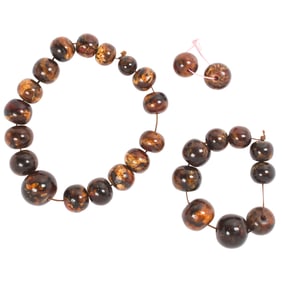 A group of Chinese root amber beads