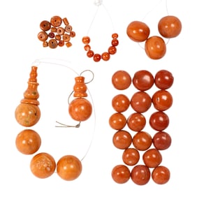 A group of Sino-Tibetan red coral beads and buttons