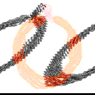 A group of Sino-Tibetan red coral beads: A group of Sino-Tibetan red coral beads. Strung as a multi-strand necklace, 20th century, 14" long. Provenance: Naomi Lindstrom