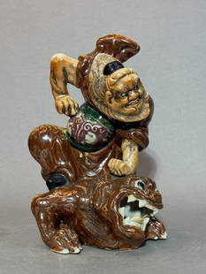 Japanese Antique Studio Porcelain Okimono, Meiji Period: Japanese Meiji period antique porcelain sculpture of deity on tiger, unsigned. 11.7"h (29.72 cm) NOTE: THIS ITEM IS IN NEW YORK, WHERE IT CAN BE SHIPPED FROM.