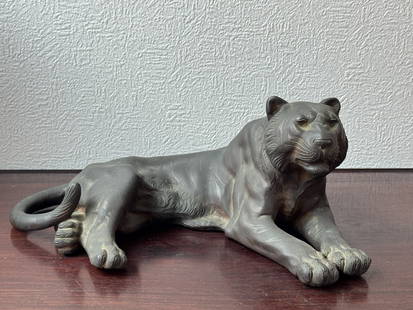 Japanese Bronze Tiger, Meiji Period: Japanese Meiji Period bronze model of tiger, signed with incised mark at bottom. 5.25"h x 12.5"w (13.34 x 31.75 cm) NOTE: THIS ITEM IS IN NEW YORK, WHERE IT CAN BE SHIPPED FROM.