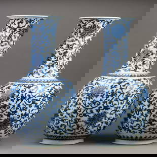 Pair of Chinese Blue and White Vases: (lot of 2) pair of large blue and white porcelain vases, well-proportioned body and long neck covered with tendril foliage divided by a lappet of patterns by the shoulder. 20"h x 10"w (50.8 x 25.4 cm)