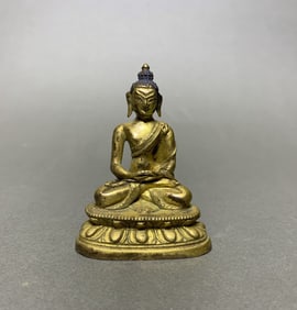 A Gilt Bronze Figure of Buddha Shakyamuni