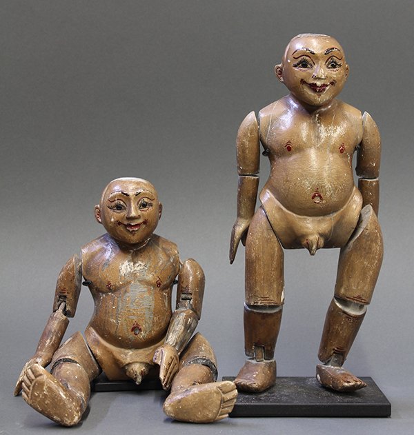 Two Burmese Wooden Puppets, 20th Century: Pair of Burmese wooden puppets, 20th century, with a pigment decorated body and face along with articulated limbs, 10.75"h