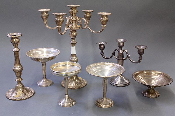 American sterling silver weighted accessories: (lot of 7) American sterling silver weighted table accessories including an Empire pedestal bowl, an Acme Silver Company compote, two additional compotes, Fisher Silversmiths three light candelabra, t