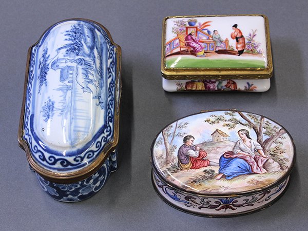 Continental style porcelain pill boxes: (lot of 3) Continental porcelain pill boxes decorated with Chinoiserie, genre, and Delft style pastoral scenes, largest: 2.25"h x 4"w x 2"d
