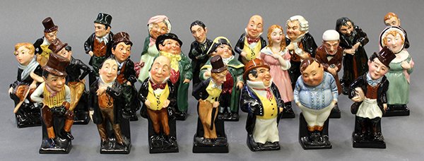 Royal Doulton figurines: (lot of 23) Royal Doulton porcelain Charles Dickens character figurines including Buzfuz, Mrs. Bardell, Sam Weller, Fat Boy, Fagin, Captain Cuttle, Little Nell, Sairey Gamp, tallest: 4.25"