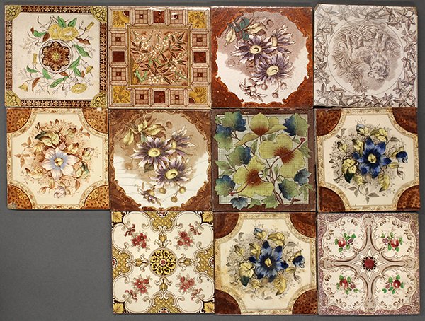 Continental faience tiles: (lot of 11) Continental faience tiles mostly with transfer decorated floral motifs, late 19th century