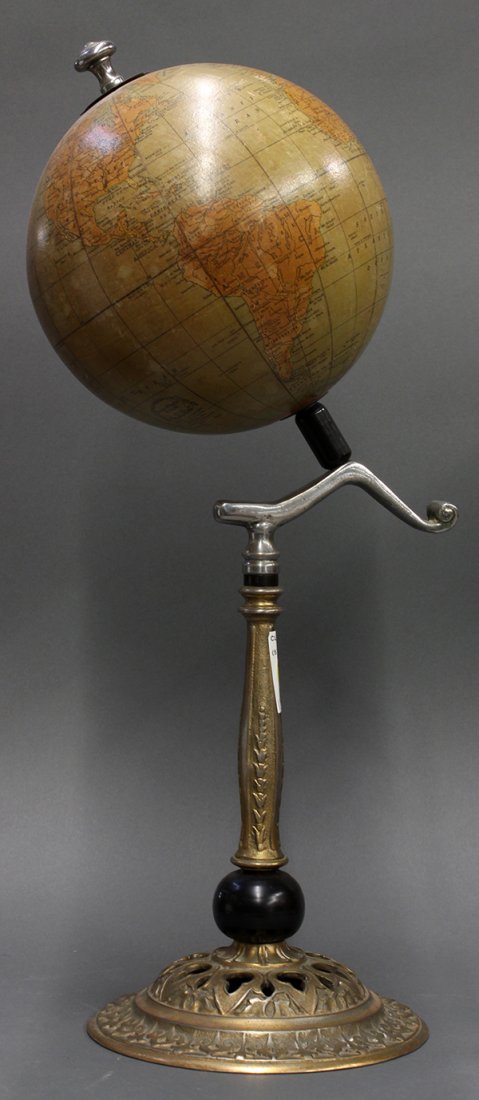 (lot of 2) Barowe Inc: (lot of 2) Barowe Inc., Chicago, Illinois, 12-inch terrestrial globe, circa 1930, having cast-metal support rising on turned wood base, 31"h, together with a Rand McNally 8" terrestrial globe, 21"h