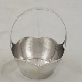 A hammered sterling silver basket