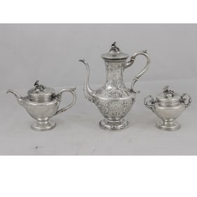 A three piece sterling silver hollowware service