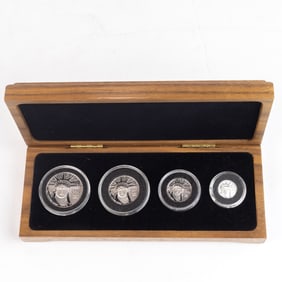 A set of four 1998 Liberty Proof Platinum coins in wood case