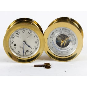 A Chelsea Ship's Bell brass clock and weather station