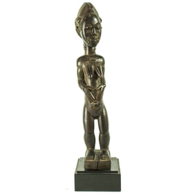 A Baule standing female figure