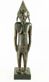 A Senufo standing female figure