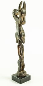 A Baule tapper