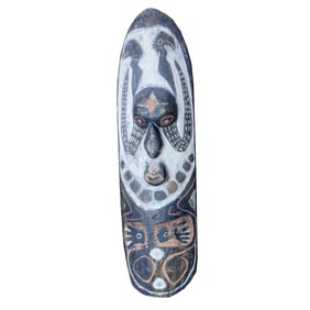 A New Guinea polychrome wood shield-form plaque