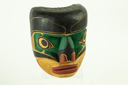 A Kwakiutl polychrome wood mask by Ross Hunt
