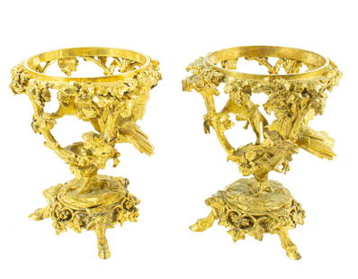 A pair of Christofle gilt bronze epergne stands: A pair of Christofle gilt bronze epergne stands, second half 19th century, each modeled as cat attacking a birds nest, each impressed 'CHRISTOFLE' and factory mark, variously numbered, 8.5"h x 7"h; 5"