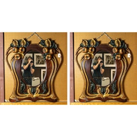 A pair of early 20th century Art Nouveau polychrome mirrors