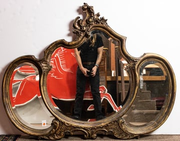A Louis XV-style giltwood mirror